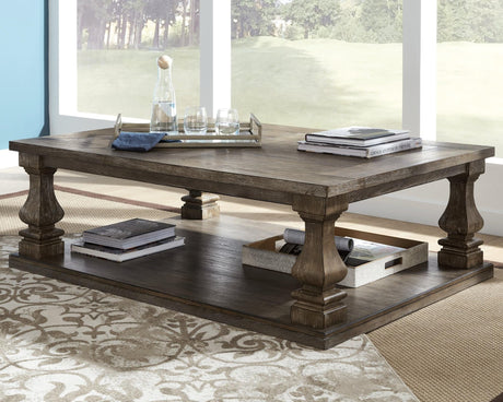Johnelle Gray rectangular coffee table angled view showing tabletop and legs