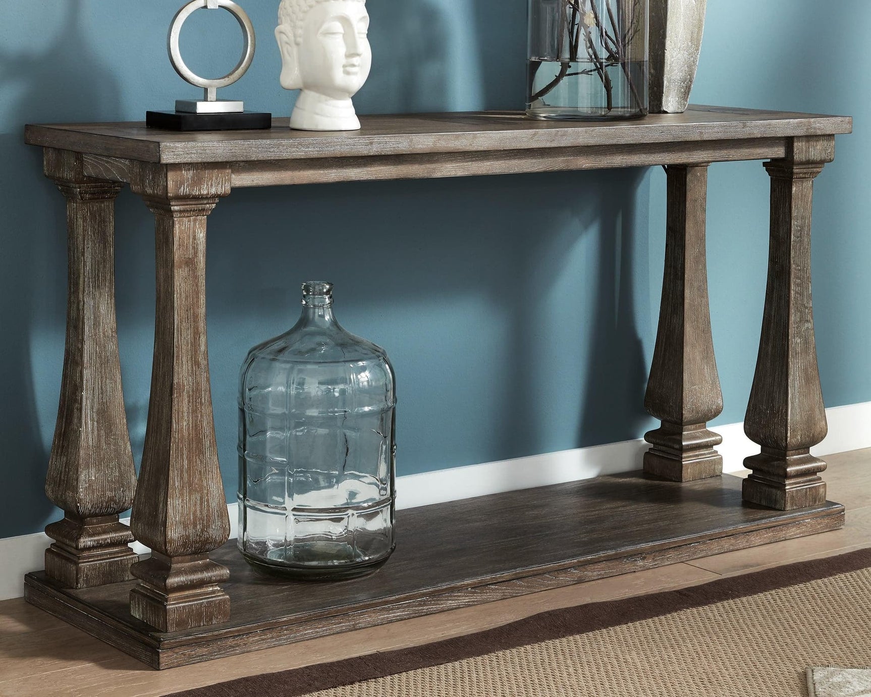 Johnelle Gray Sofa Table front view showing plank-effect tabletop and weathered gray finish