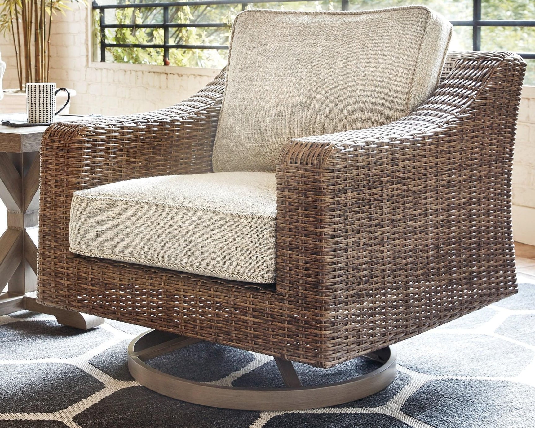 Beachcroft Beige Outdoor Swivel Lounge Chair front angle