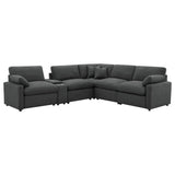 Collins 6-piece Modular Power Reclining Sectional in dark grey fabric, angled front view