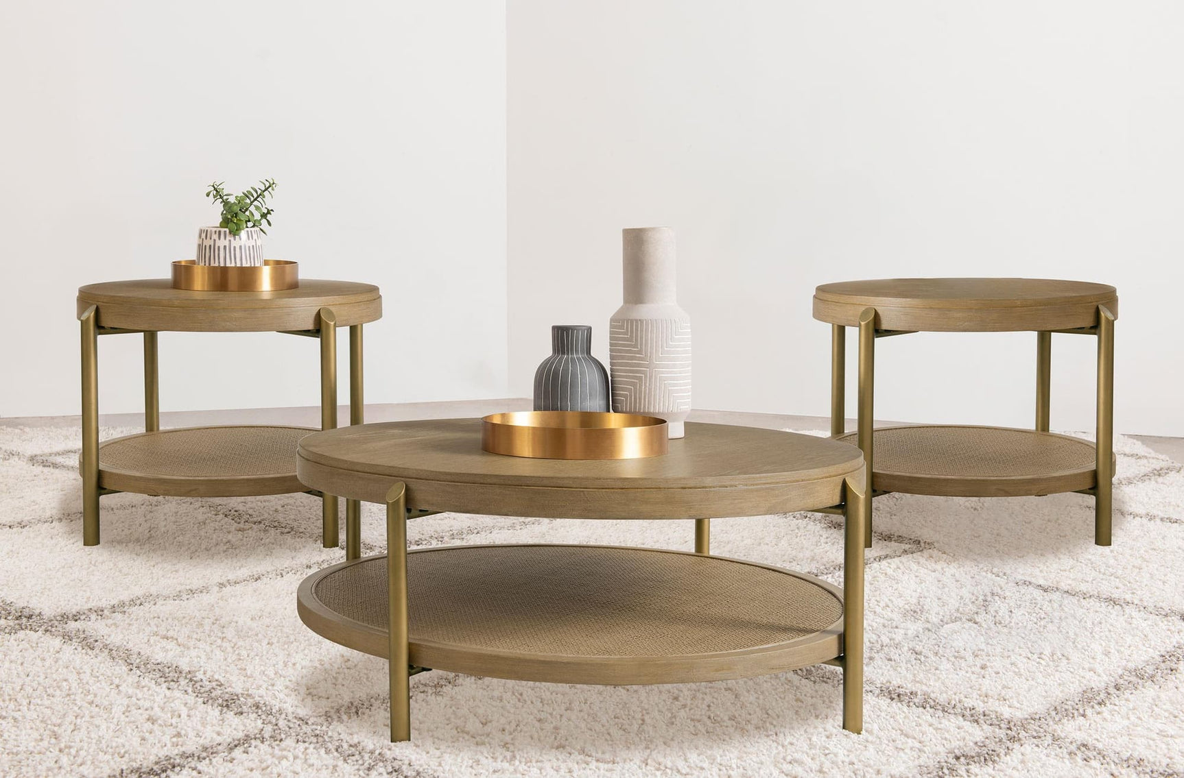 Arini 3-piece round coffee and end table set in sand wash finish, front view