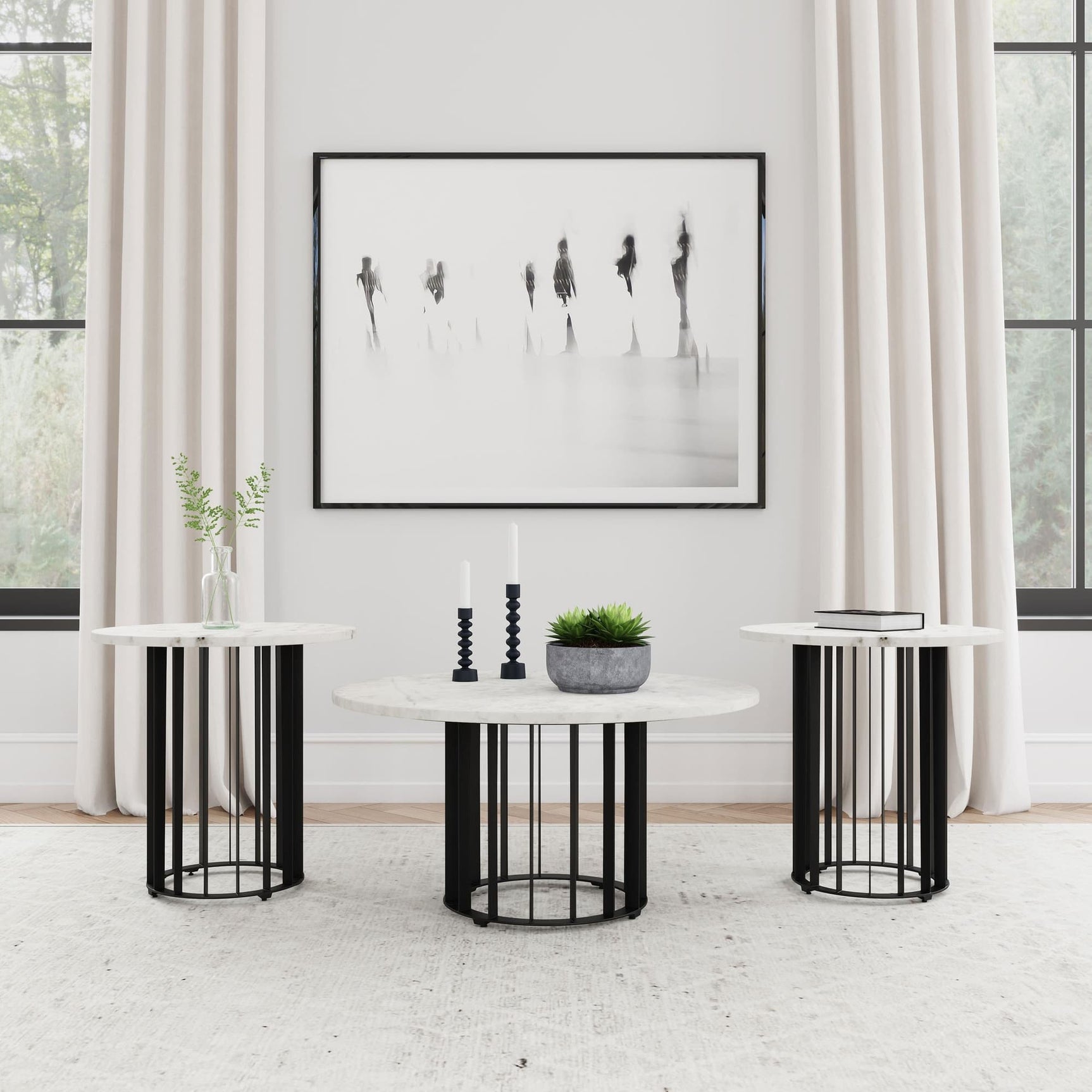 Haven 3-piece round coffee and end table set showing black marble top and iron base