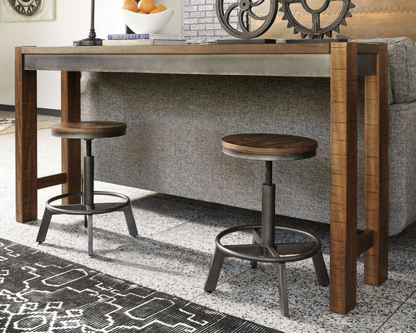 Torjin brown and gray counter height dining table with two matching barstools