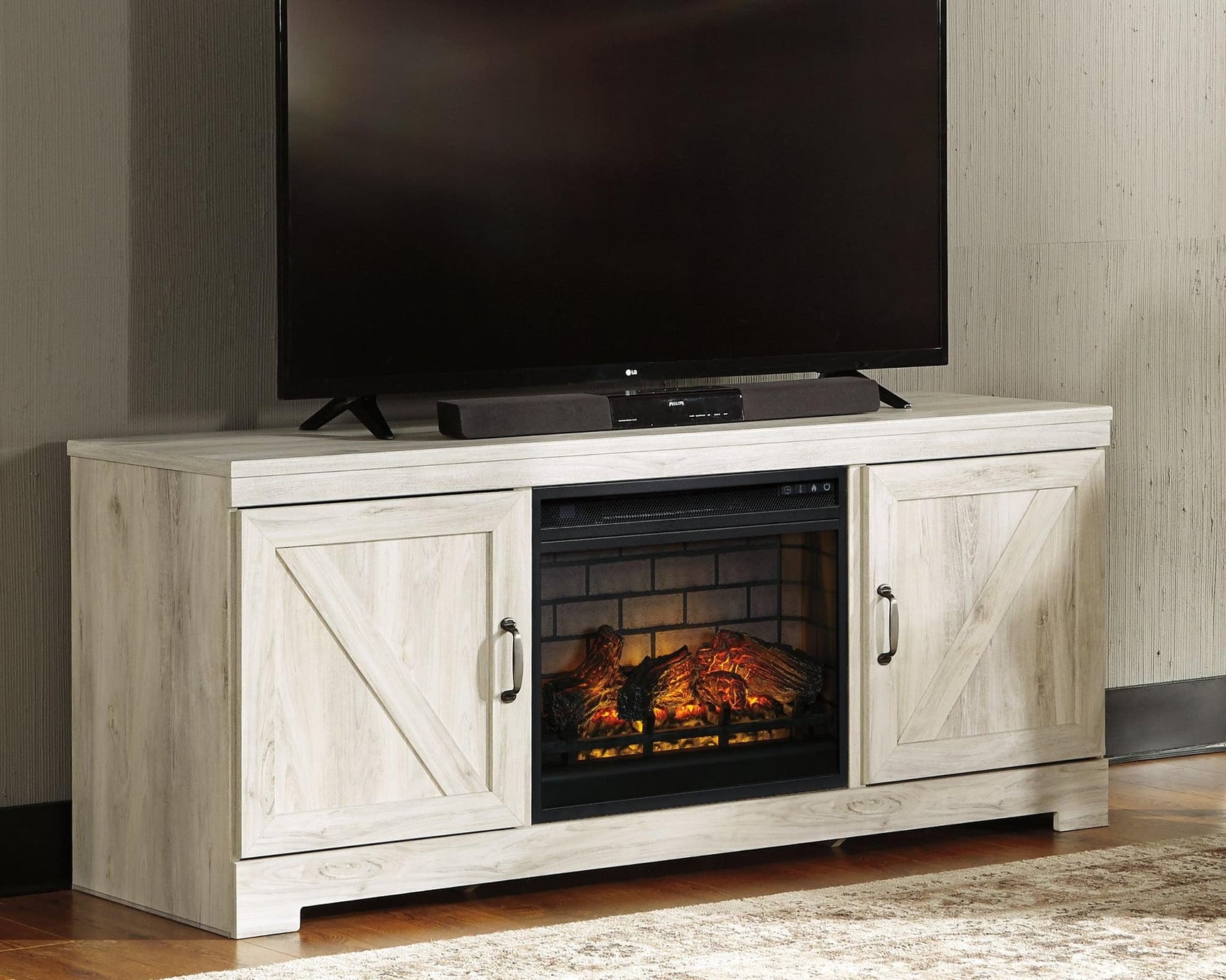 Bellaby 63 inch whitewash TV stand with electric fireplace angled view