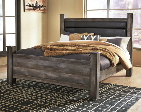 Wynnlow Gray King Poster Bed front view showing upholstered headboard and posts