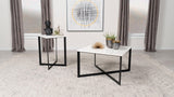 Tobin coffee table with white marble top and black iron crisscross base, front angle