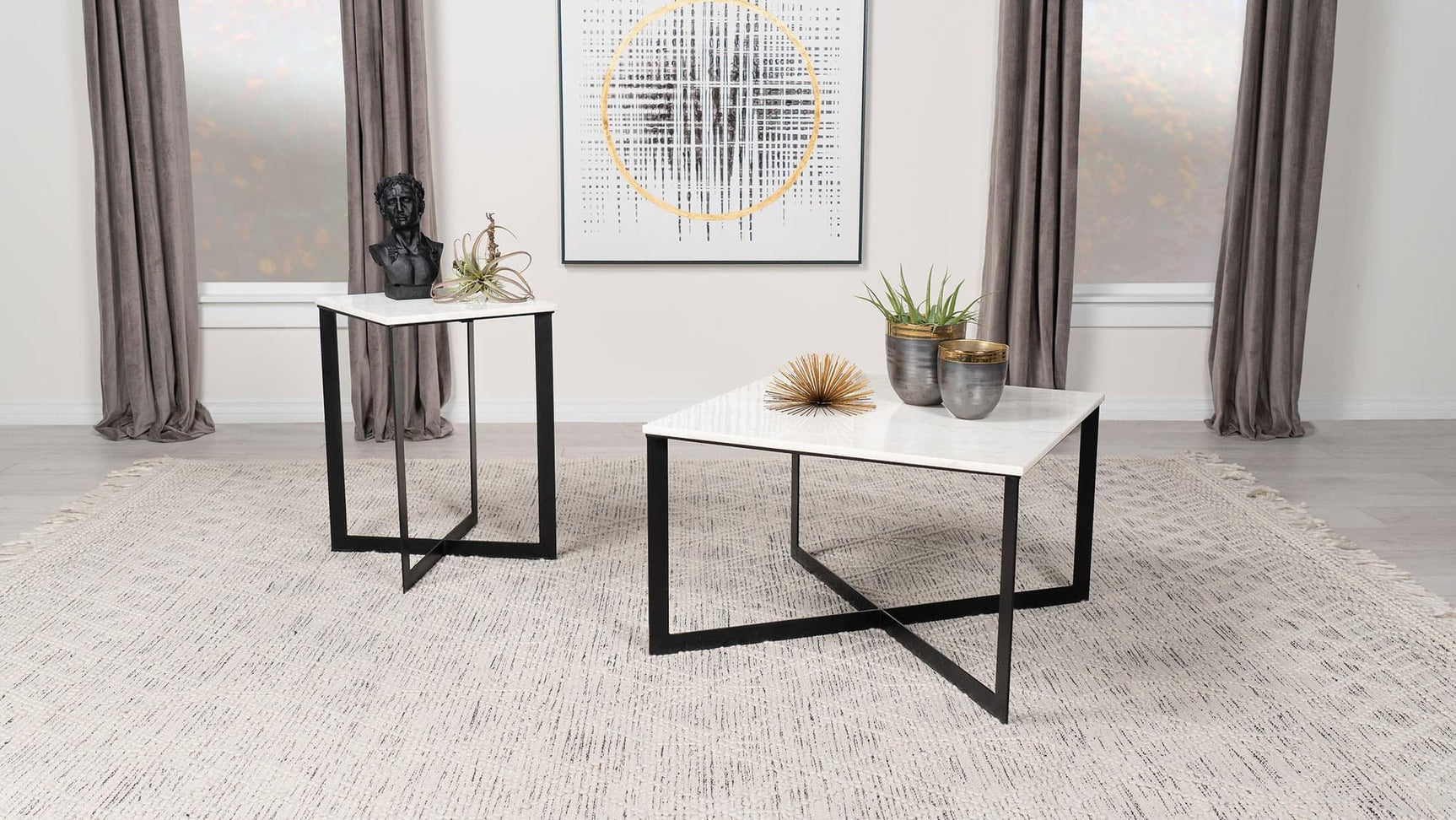 Tobin coffee table with white marble top and black iron crisscross base, front angle