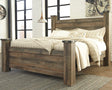 Trinell Brown King Poster Bed front view with rustic plank finish