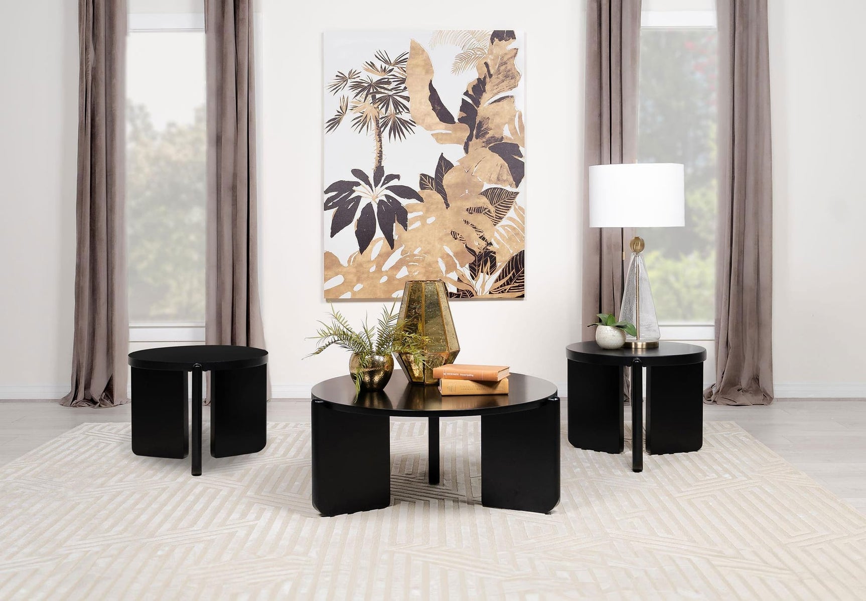 Cordova black solid wood coffee table with round top and architectural legs