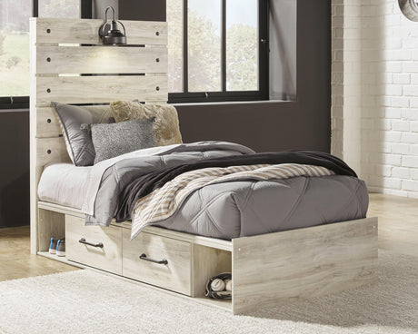 Cambeck Twin Bed in whitewash finish showcasing slatted paneled headboard