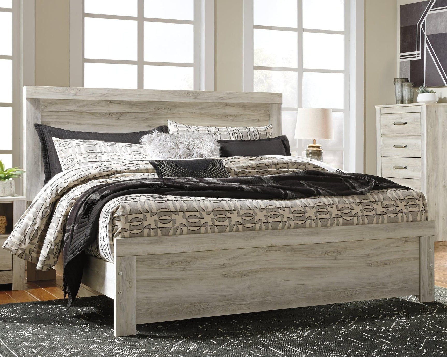 Bellaby Whitewash King Panel Bed angled view showing headboard