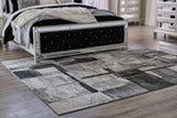 Brycebourne medium rug in black, cream, and gray abstract pattern - top view