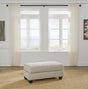 Asanti Fog Chenille Ottoman angled view showing tufted cushion and grey chenille fabric