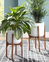 Dorcey planter set of 2 with white metal containers and brown stands front view