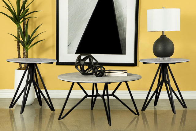 Hadi 3-piece round coffee and end table set, front angle showing cement top and gunmetal geometric base