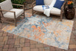 Wraylen Multi 7'10" x 10' Rug with geometric abstract pattern