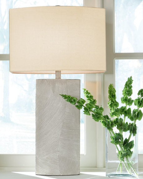 Bradard brown polyresin table lamp with straight-sided oval fabric shade