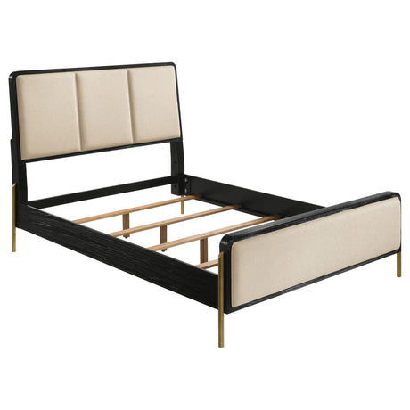 Arini queen panel bed with cream fabric upholstery and black frame, front view