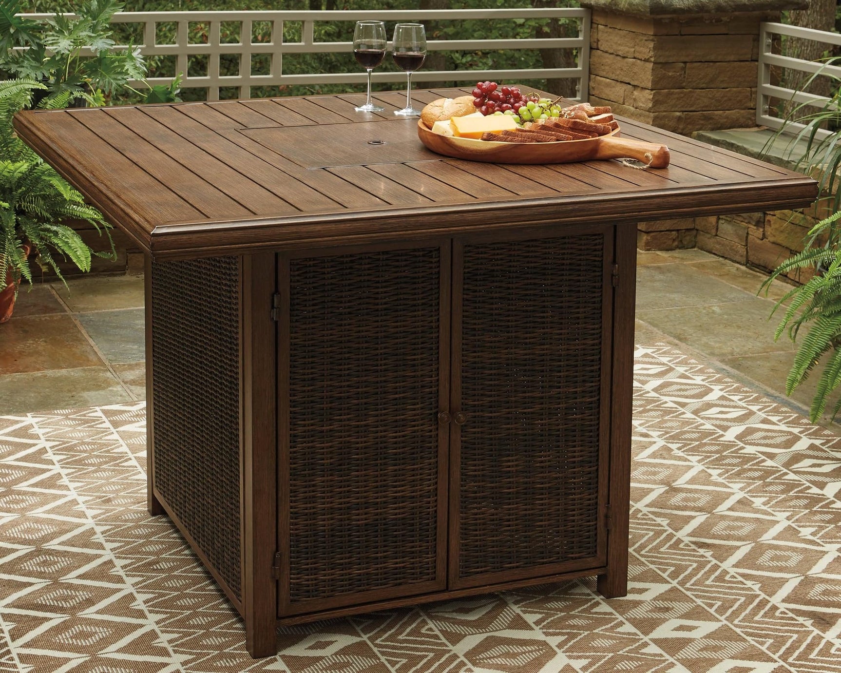 Paradise Trail Medium Brown Outdoor Bar Table with Fire Pit top view