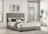 Dorian taupe fabric upholstered queen panel bed front angle