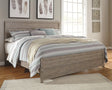 Gray finished Culverbach king panel bed with storage drawers front view