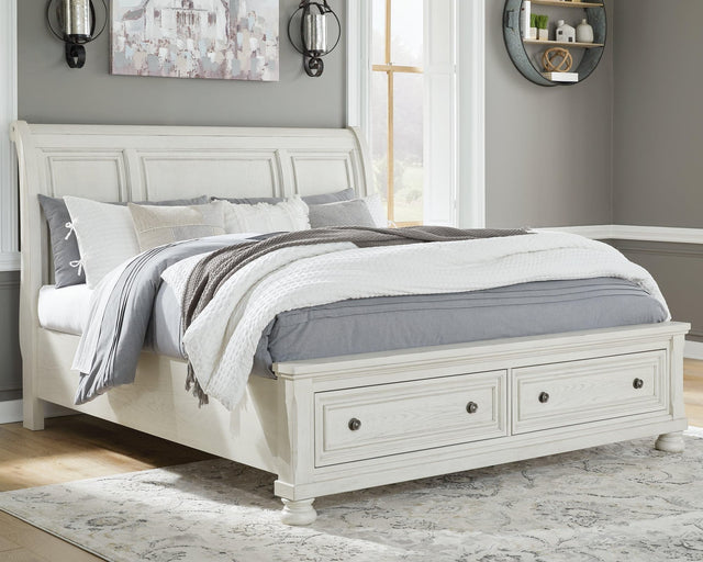 Robbinsdale Antique White Queen Sleigh Bed with Storage front angle