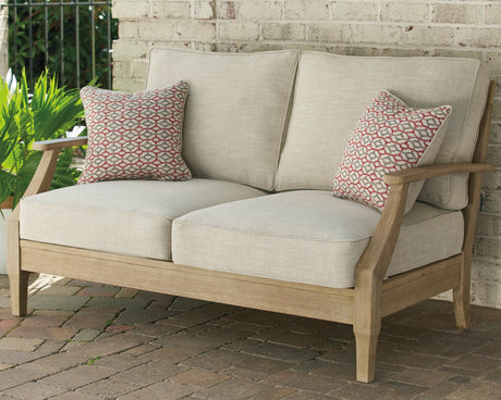 Clare View beige outdoor loveseat front angle