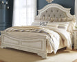 Realyn Chipped White Queen Upholstered Panel Bed angled view