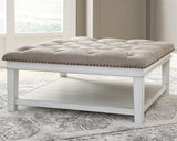 Kanwyn Whitewash Upholstered Ottoman Coffee Table front angle