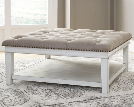 Kanwyn Whitewash Upholstered Ottoman Coffee Table front angle