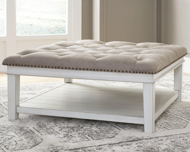 Kanwyn Whitewash Upholstered Ottoman Coffee Table front angle