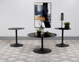 Ganso black round glass top coffee table with metal tulip base