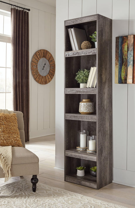 Wynnlow Gray Pier TV Stand front angle with shelves visible