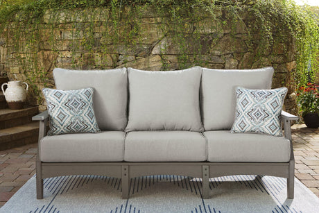 Visola Gray Outdoor Sofa with cushions angled view