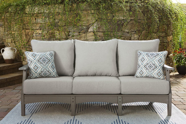 Visola Gray Outdoor Sofa with cushions angled view