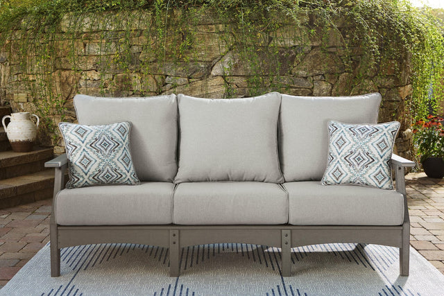 Visola Gray Outdoor Sofa with cushions angled view