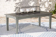 Visola Gray Outdoor Coffee Table angled view showing slatted tabletop and lower shelf