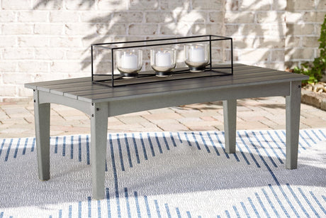 Visola Gray Outdoor Coffee Table angled view showing slatted tabletop and lower shelf