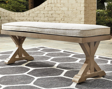 Beachcroft beige outdoor dining bench with cushion side view