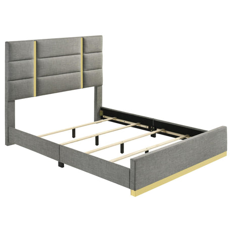 Ines Eastern King panel bed in grey fabric with gold vertical acrylic strips headboard front view