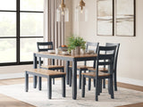 Gesthaven dining table set showing natural wood finish and blue accents