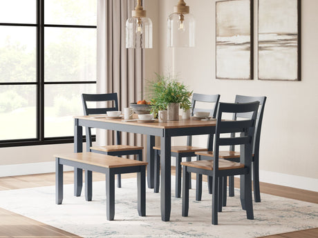 Gesthaven dining table set showing natural wood finish and blue accents