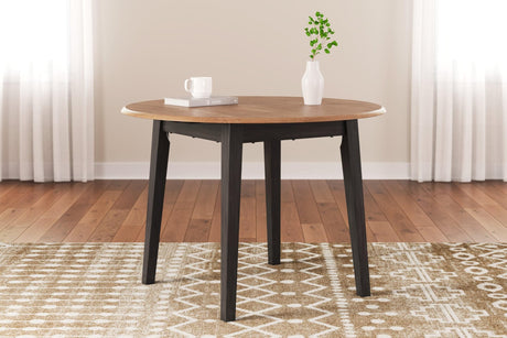 Gesthaven natural brown round dining drop leaf table front angle