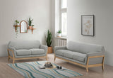 main view of Vaughn grey fabric upholstered sofa and loveseat set
