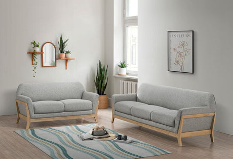 main view of Vaughn grey fabric upholstered sofa and loveseat set