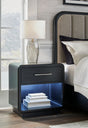 Rowanbeck Black Nightstand front view with LED nightlight lit