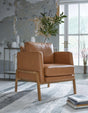 Numund caramel faux leather accent chair front view