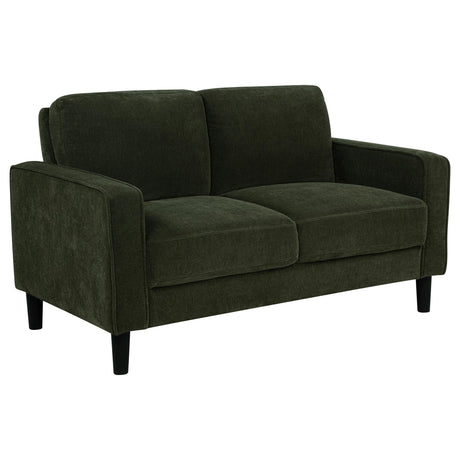 Ruth loveseat in matcha green fabric, angled front view
