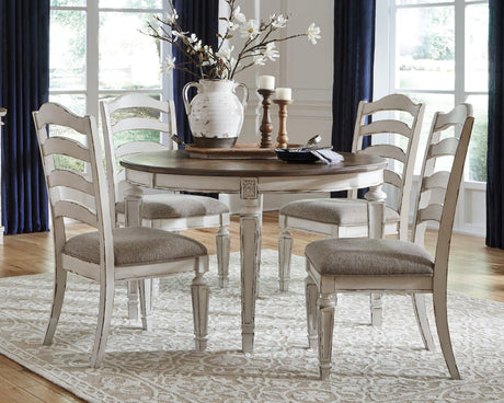 Realyn Chipped White Oval Dining Room Set dining table angled view