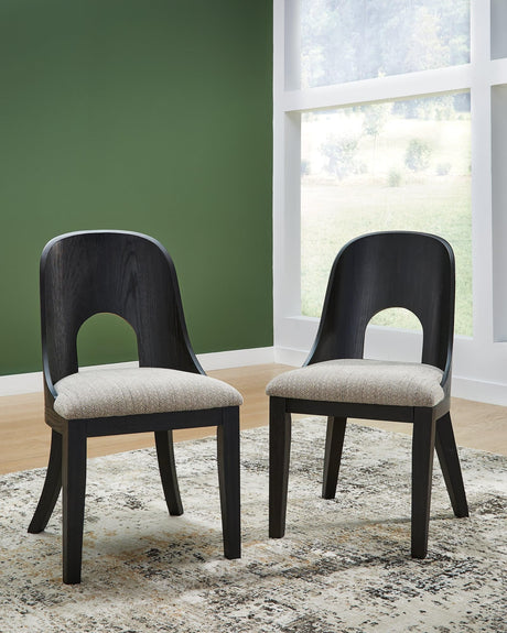 Rowanbeck dining chair angled view showing curved back and cushioned seat